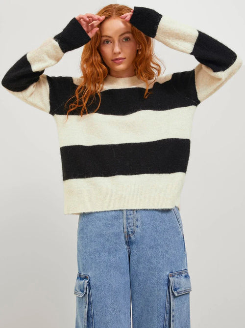 Chic color block striped sweater with relaxed silhouette and cozy contemporary boutique fashion appeal.