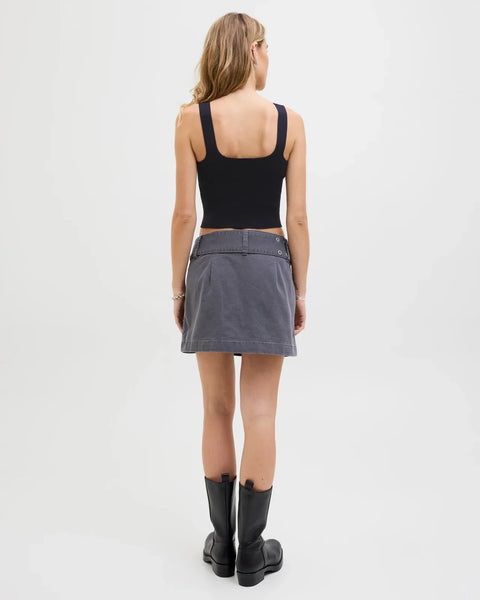 Contemporary sleeveless knit top with clean lines and elevated quiet luxury aesthetic.