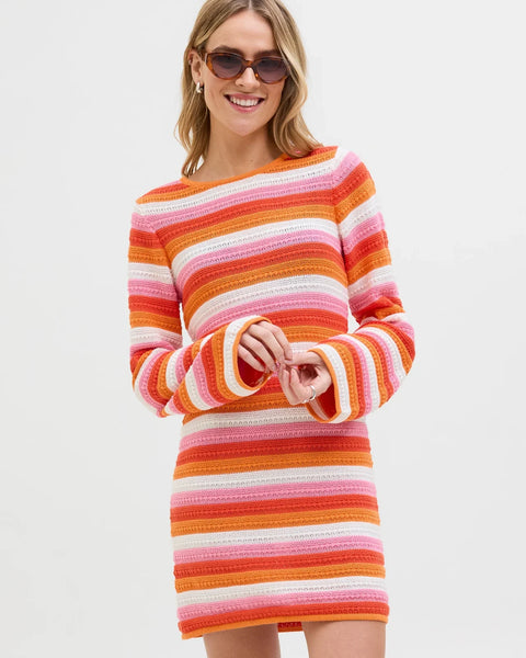 Trendy crochet-inspired striped sweater dress with bell sleeves and playful Y2K fashion vibe.
