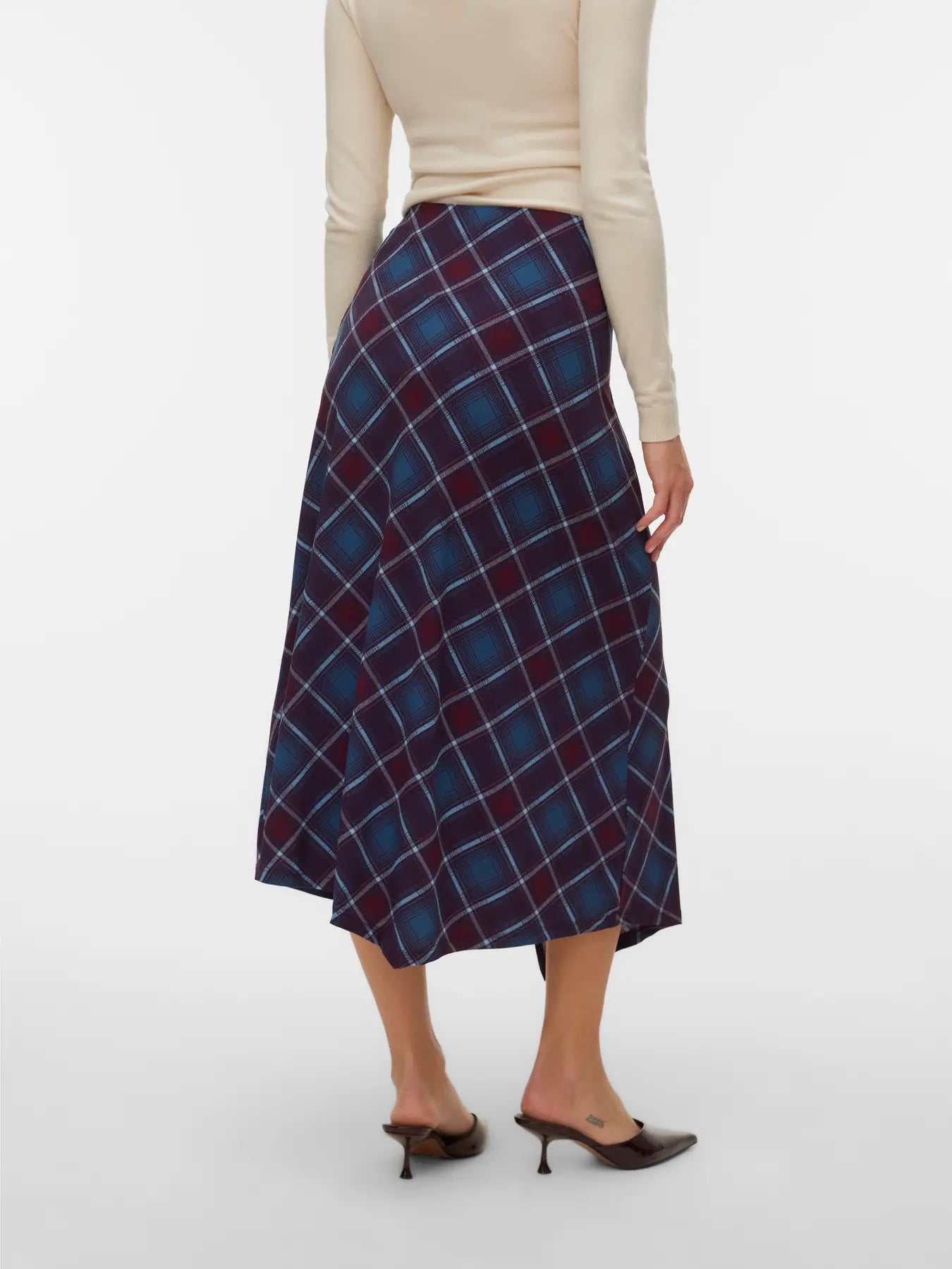 Women's multicolor plaid midi skirt featuring rich burgundy and blue tones with a flowing handkerchief hem for stylish cold-weather outfits.