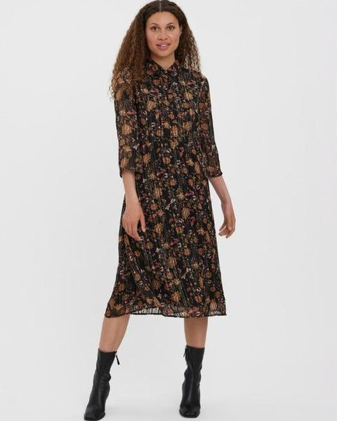 Vintage-inspired black floral dress with button-front detail and lightweight pleated fabric.