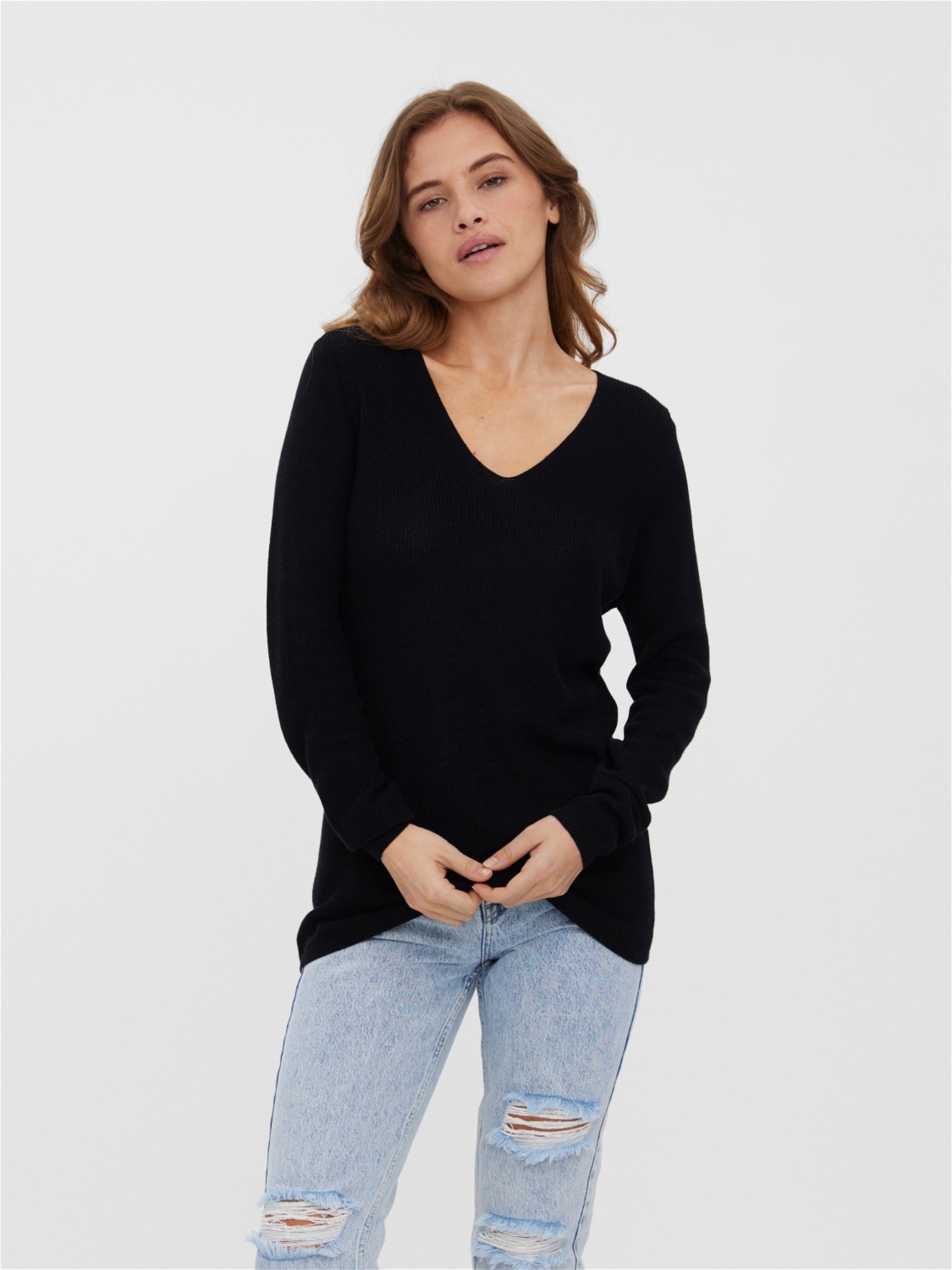 Women's casual knit sweater offering modern style, comfort, and year-round versatility.