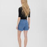 Relaxed fit cuffed denim shorts with button fly fastening and timeless casual appeal.