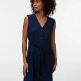 Minimalist navy blue midi dress designed with flattering tailoring, practical pockets, and breathable fabric for all-day comfort.