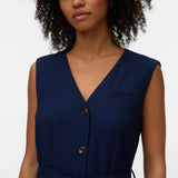 Versatile navy sleeveless dress with waist tie and button-front closure for elevated smart casual outfits.
