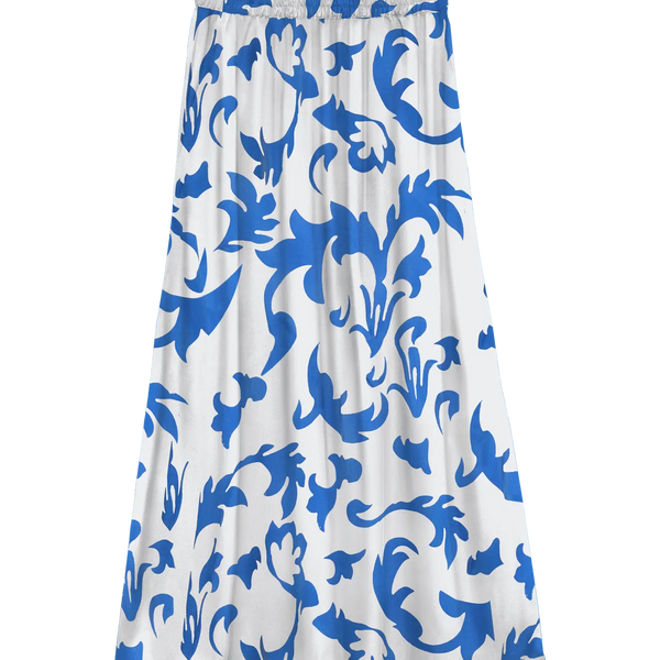 Women's white and cobalt blue botanical print midi skirt with elastic waist and flowing A-line silhouette for resort vacations and summer style.