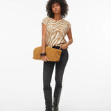 Lightweight camel zebra print top with boat neckline, cap sleeves and breathable knit construction for casual chic and vacation outfits.