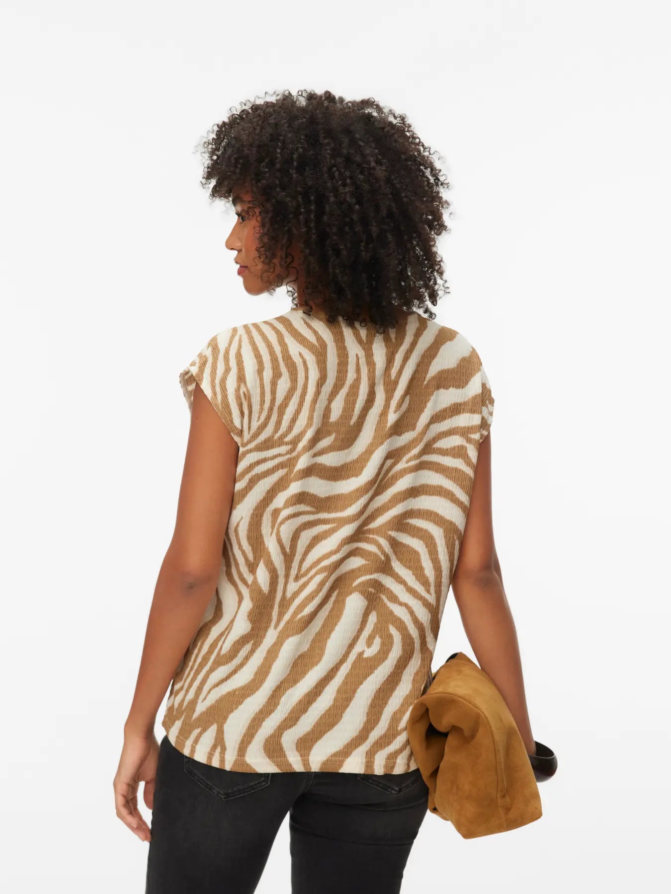 Elegant neutral zebra print sweater top featuring a lightweight knit, cap sleeves and modern boat neck for effortless boutique fashion.