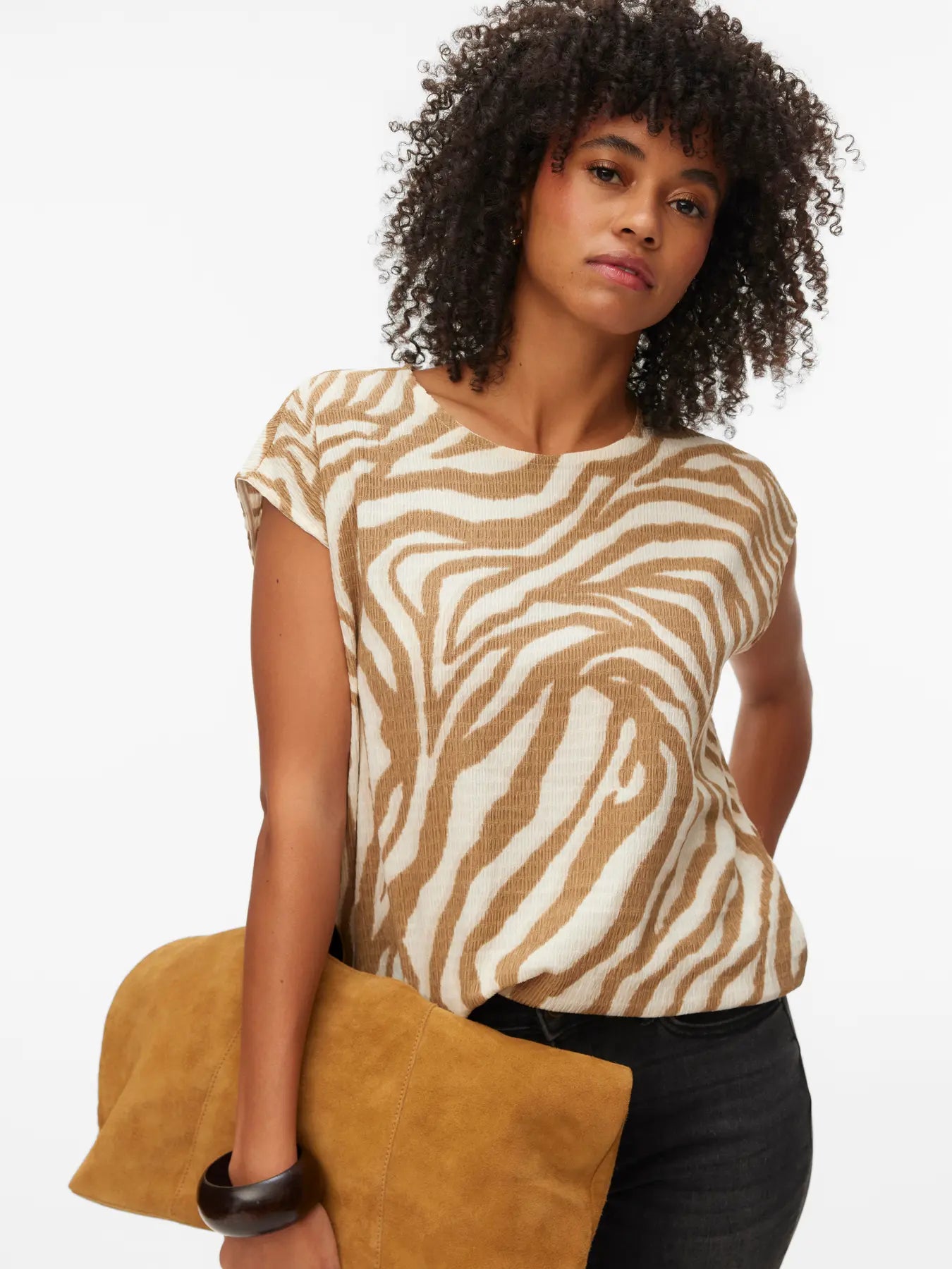 Women's camel and ivory zebra print knit top with cap sleeves, boat neckline and relaxed fit for chic everyday and resort style.