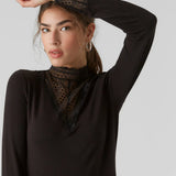 Women’s black lace high neck blouse with long sleeves and sophisticated feminine silhouette for modern style.