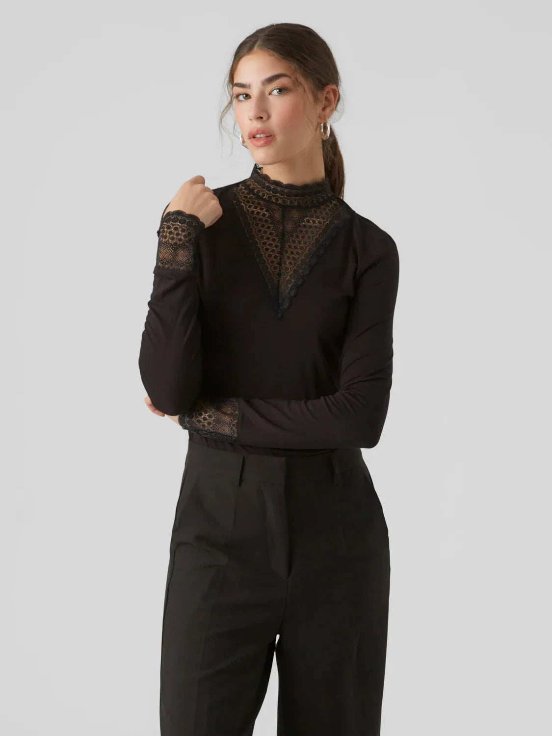 Women’s ultra feminine black lace detail blouse with sheer high neckline and long sleeves for elegant evening and party outfits.