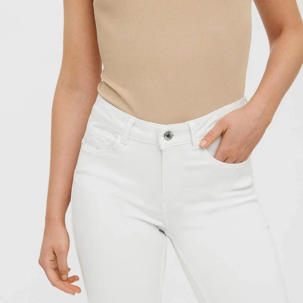 Everyday white skinny jeans for women with stretch fabric and flattering streamlined silhouette.