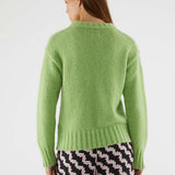 Casual chic women’s green pullover sweater with chunky ribbed accents and oversized cozy silhouette for everyday wear.