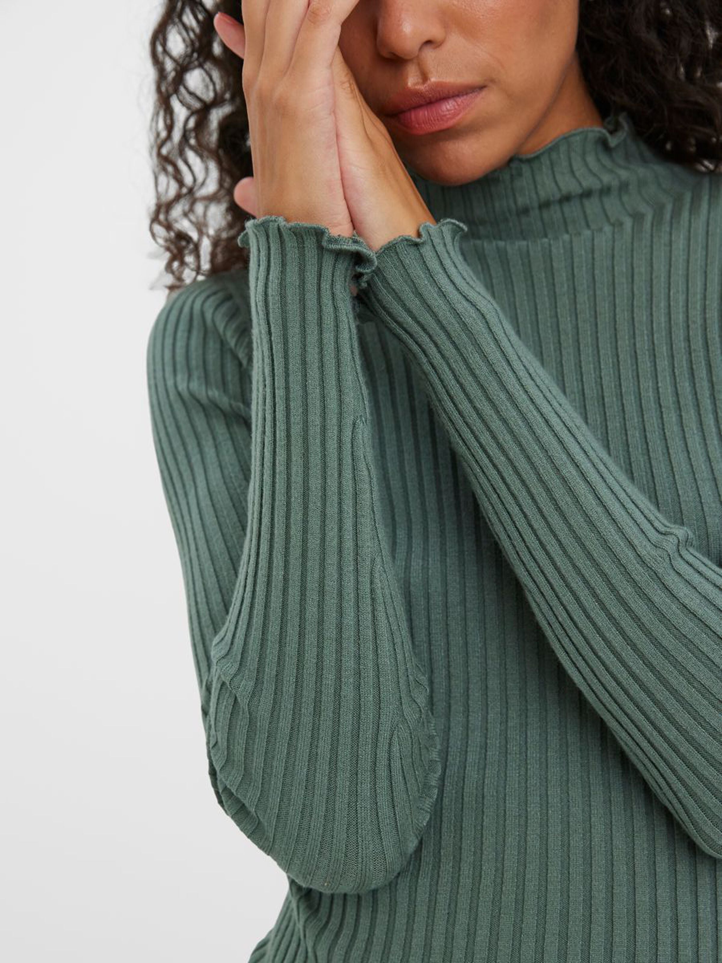 Women's ribbed knit essential designed with a modern slim fit and elegant neckline.