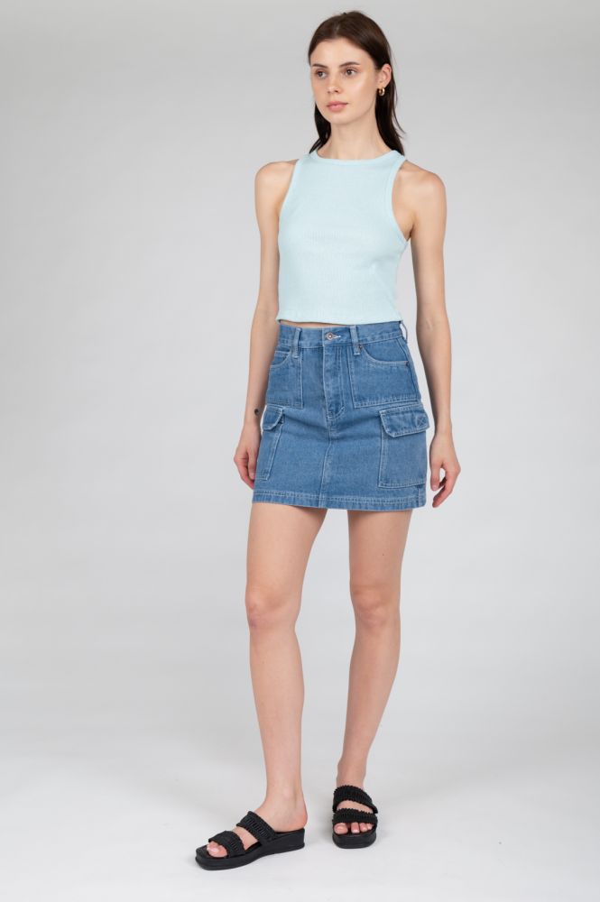 Light blue sleeveless top ideal for spring fashion, travel outfits, and weekend wear.