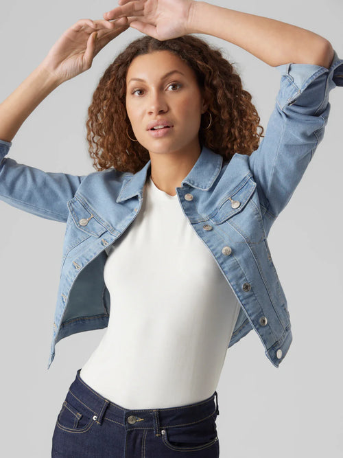 Light blue denim jacket featuring a versatile fit and authentic vintage-inspired wash.