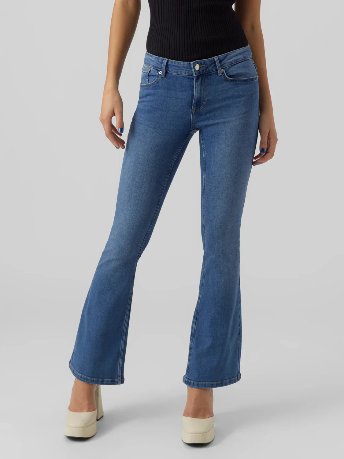 Blue bootcut jeans for women featuring slim fit through the hips and flattering cropped flare leg.
