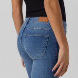 Medium wash cropped jeans for women with slight flare silhouette and effortless casual chic style.