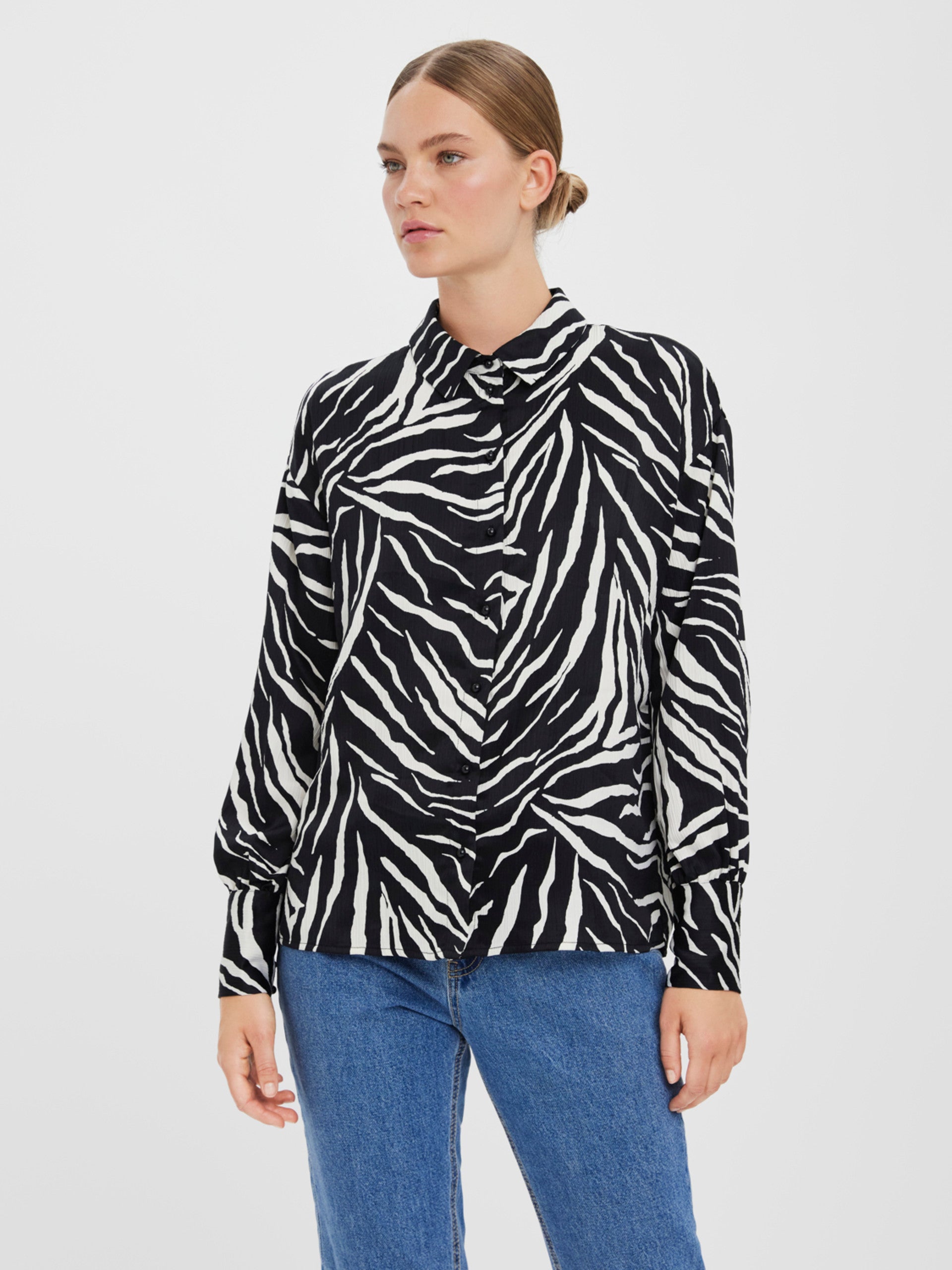 Women’s monochrome zebra print shirt with relaxed tailoring and statement pattern for casual and office outfits.
