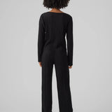 Women’s lightweight black pleated top featuring relaxed fit and polished minimalist wardrobe design.