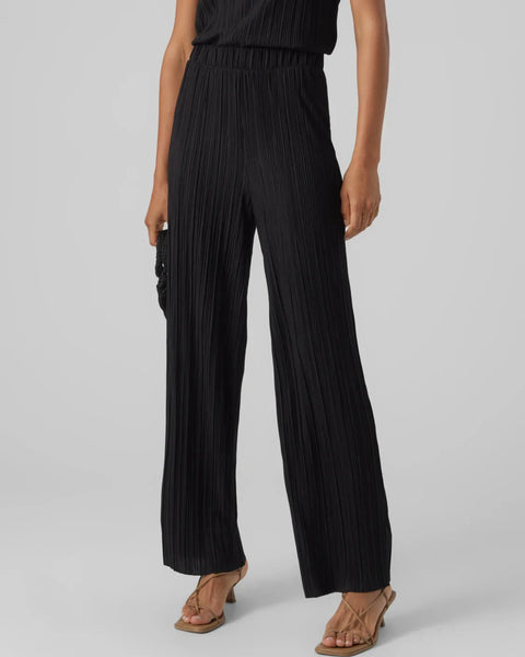 Black flowy wide leg pants for women with pleated fabric and elevated casual chic styling.