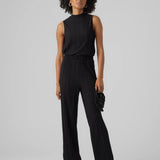 Women’s dressy black wide leg pants featuring soft pleated texture and effortless evening-ready style.
