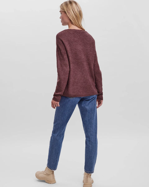 Women’s burgundy V-neck sweater with relaxed fit, long sleeves, and soft knit texture for casual fall and winter outfits.