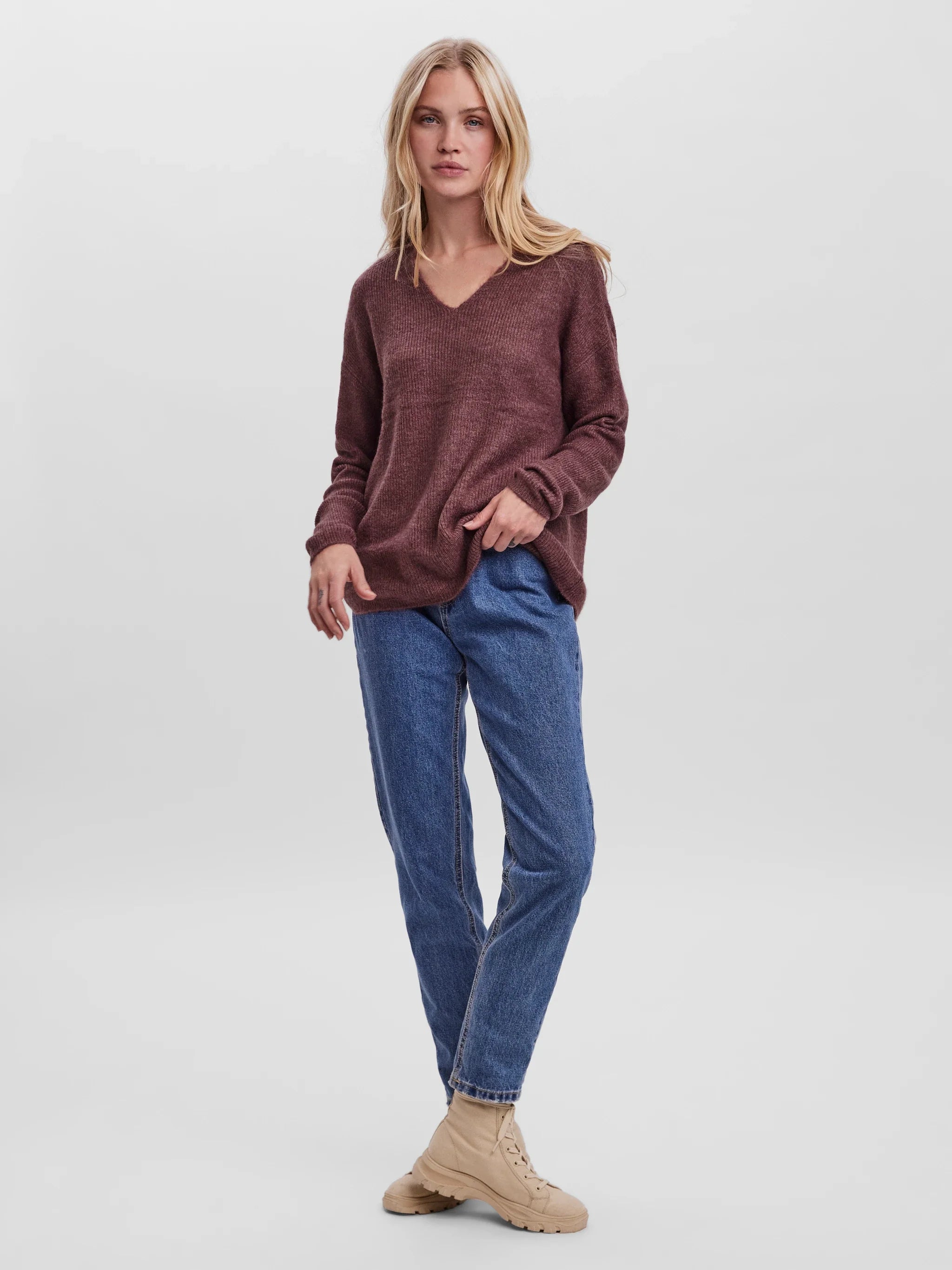 Women’s relaxed-fit burgundy knit pullover with V-neckline for smart casual, weekend, and everyday outfits.
