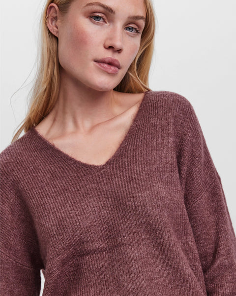 Women’s wine red V-neck knit sweater featuring a relaxed silhouette and lightweight knit for effortless everyday style.