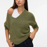 Women’s green V-neck knit sweater featuring a relaxed silhouette and ribbed trim for effortless everyday style.