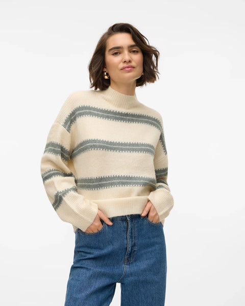 Cozy striped mock neck sweater in cream and grey with relaxed silhouette and effortless casual style.