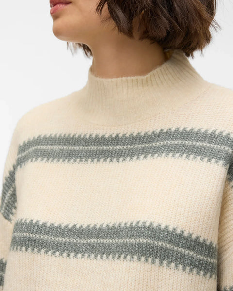 Women’s cozy mock neck pullover with subtle stripe pattern and elevated everyday fashion versatility.