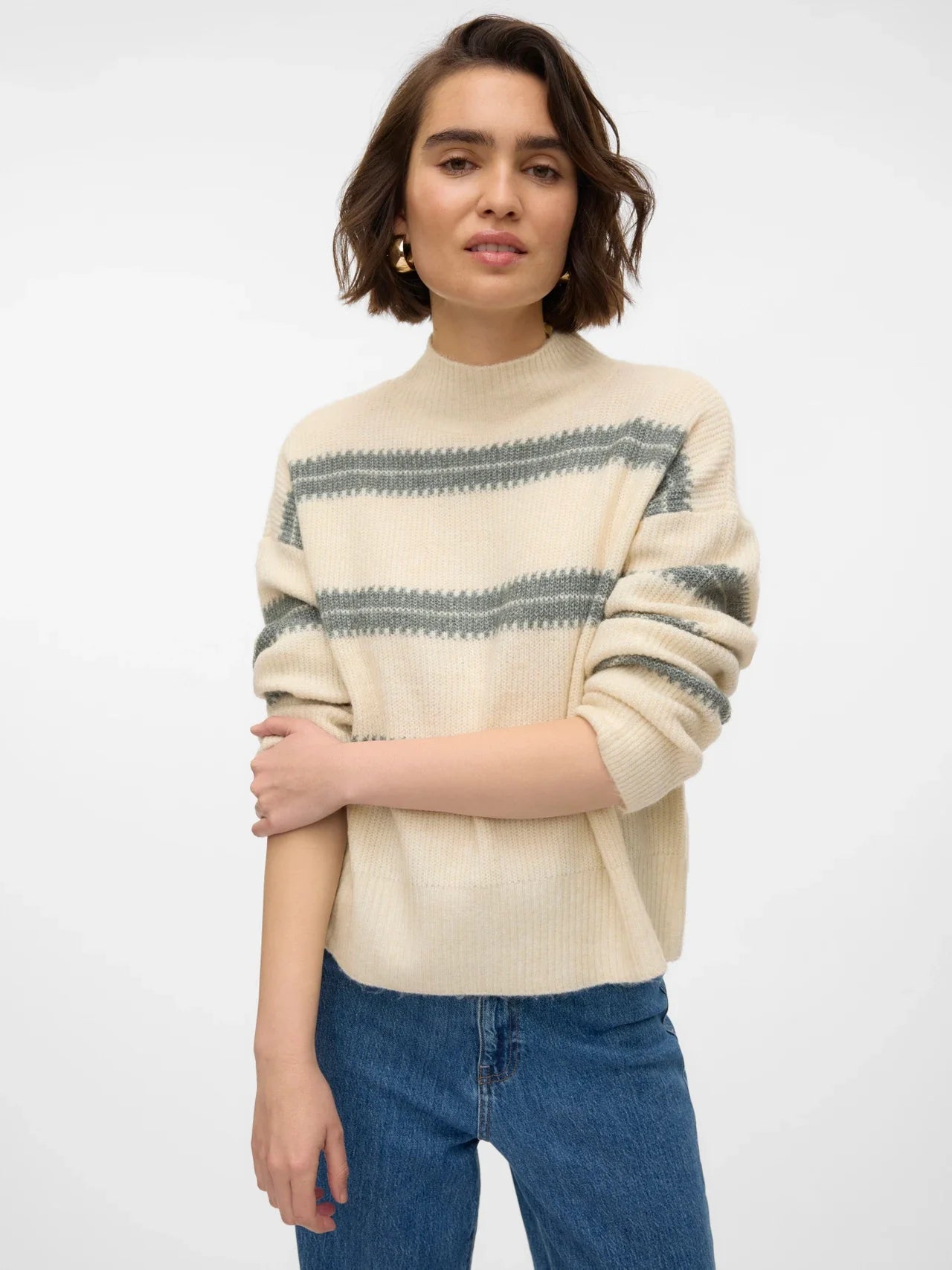 Chic neutral striped sweater with soft-touch knit texture and effortless off-duty outfit styling.