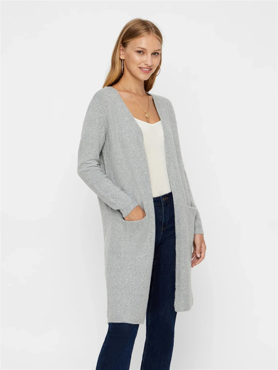 Chic light gray duster cardigan featuring soft knit fabric and relaxed modern boutique fashion appeal.