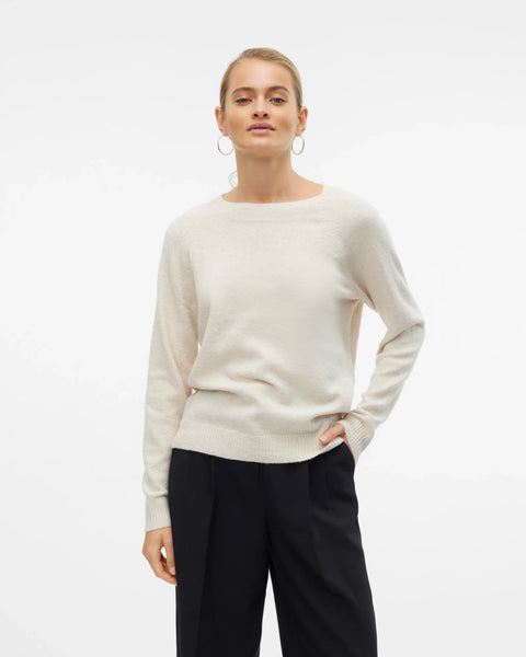Women’s ivory crew-neck sweater with long sleeves and relaxed fit for minimalist outfits, casual workwear, and everyday fall fashion.