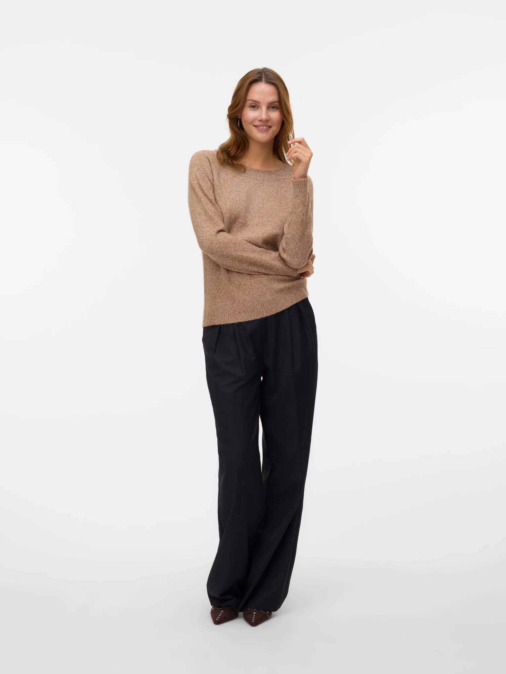 Women’s tan crew-neck sweater for chic neutral autumn outfits with trousers, skirts, and jeans.