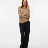 Women’s tan crew-neck sweater for chic neutral autumn outfits with trousers, skirts, and jeans.