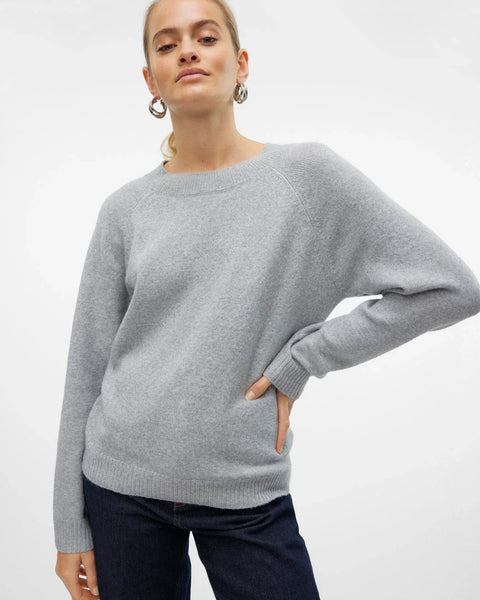 Women’s soft-touch gray sweater featuring classic round neckline and comfortable relaxed knit silhouette.