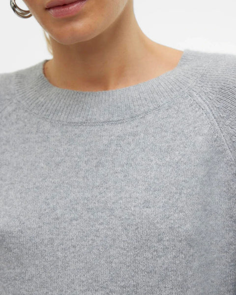 Lightweight gray sweater for women with soft knit material and timeless Scandinavian-inspired fashion look.