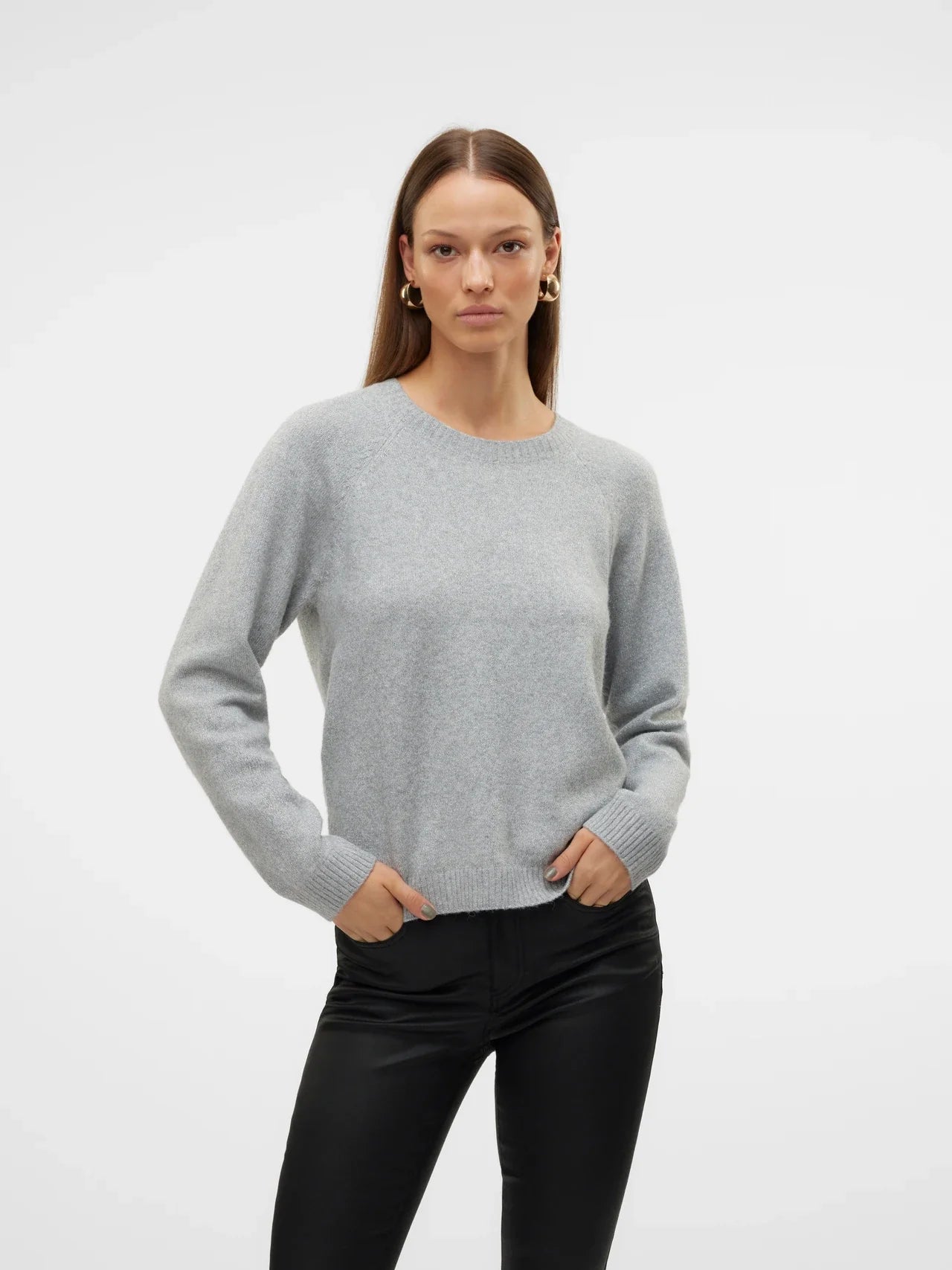 Women's minimalist grey crew neck sweater with ribbed cuffs and hem for a timeless capsule wardrobe essential.