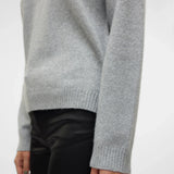 Women's minimalist light grey crew neck sweater with relaxed silhouette for work, weekend and transitional season outfits.