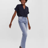 High-rise straight fit jeans in vintage light wash denim for versatile casual looks and elevated street style outfits.