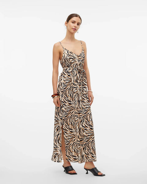 Elevated casual maxi dress featuring tiger-inspired print and feminine flowy silhouette for warm-weather wear.
