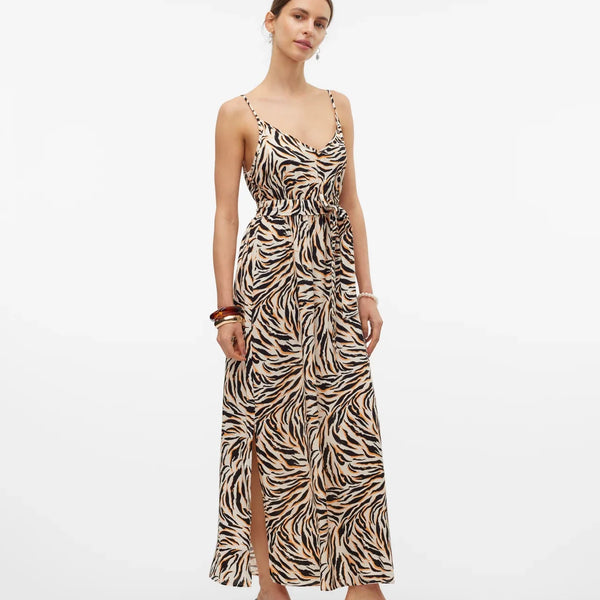 Elevated casual maxi dress featuring tiger-inspired print and feminine flowy silhouette for warm-weather wear.