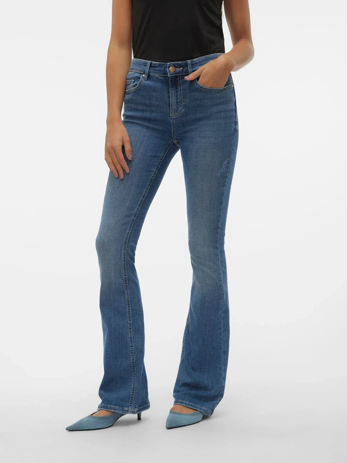 Women’s slim flare denim jeans with medium blue wash and elongating fit for polished casual outfits.