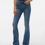 Women’s slim flare denim jeans with medium blue wash and elongating fit for polished casual outfits.