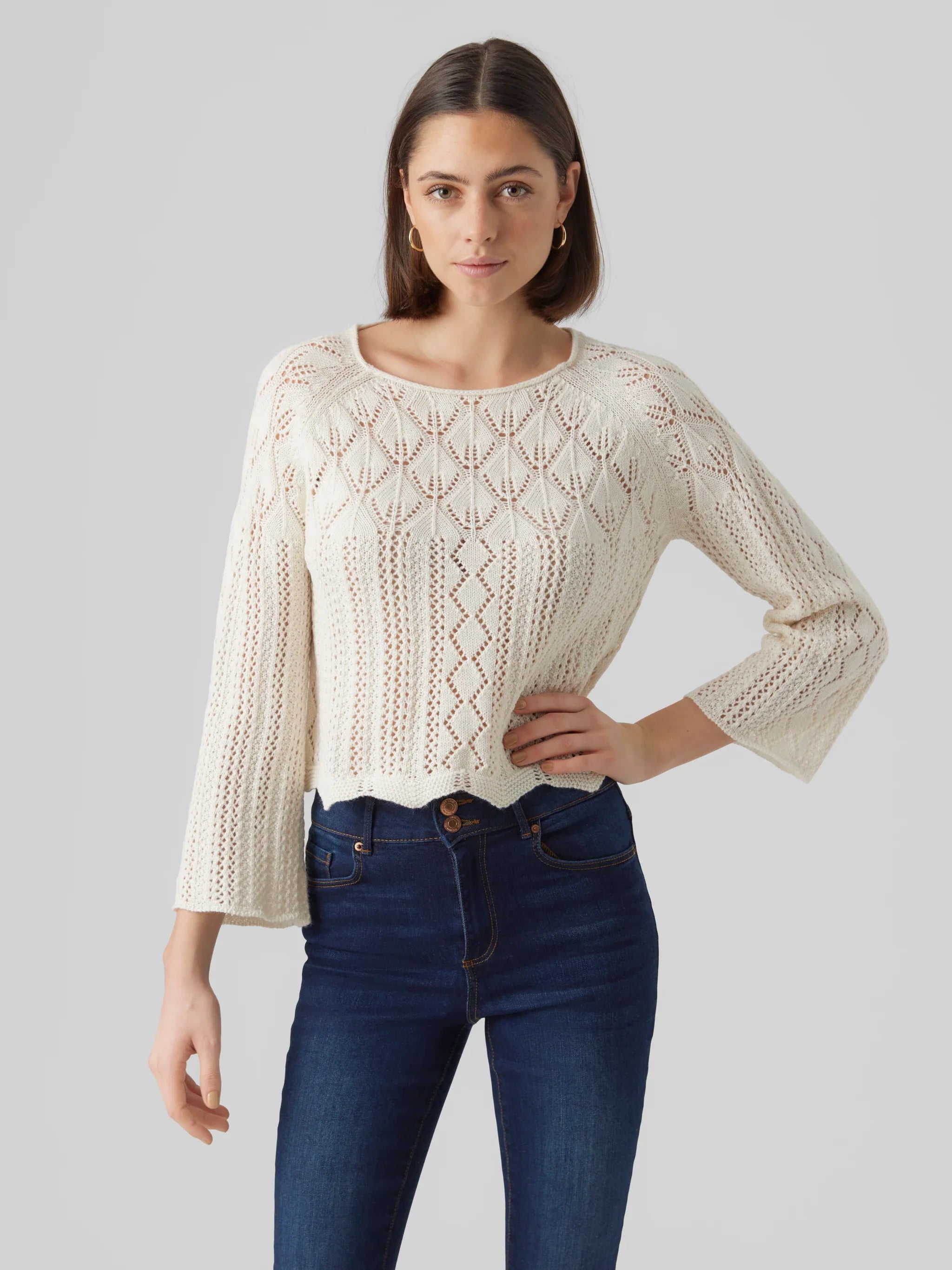 Women’s lightweight bohemian sweater with soft textured knit and elevated casual everyday styling.