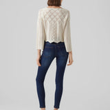 Women’s boho knit sweater in ivory with romantic crochet detailing and elevated casual chic style.