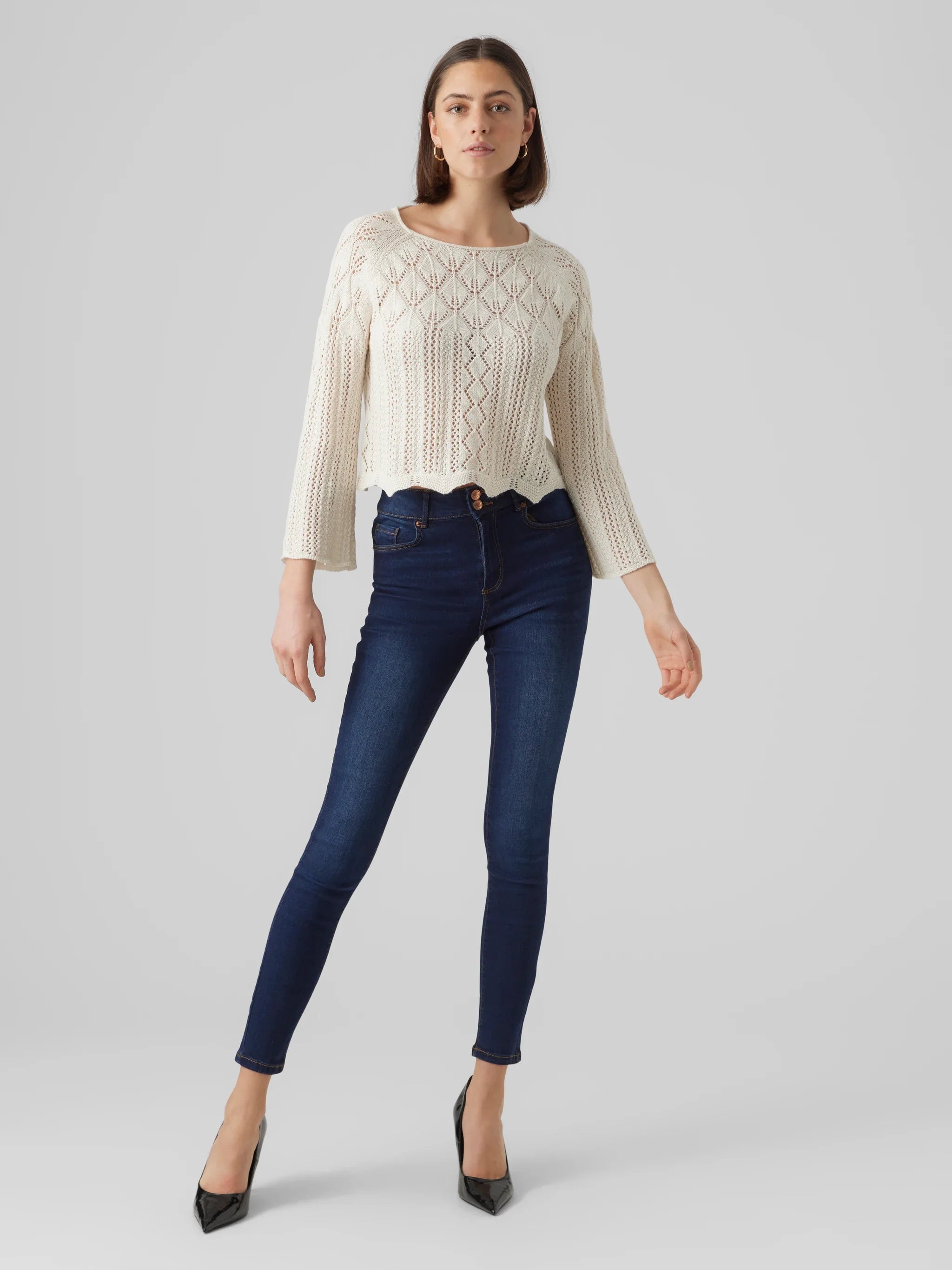 Boutique-style ivory crochet knit sweater with oversized sleeves and trendy soft girl fashion vibe.