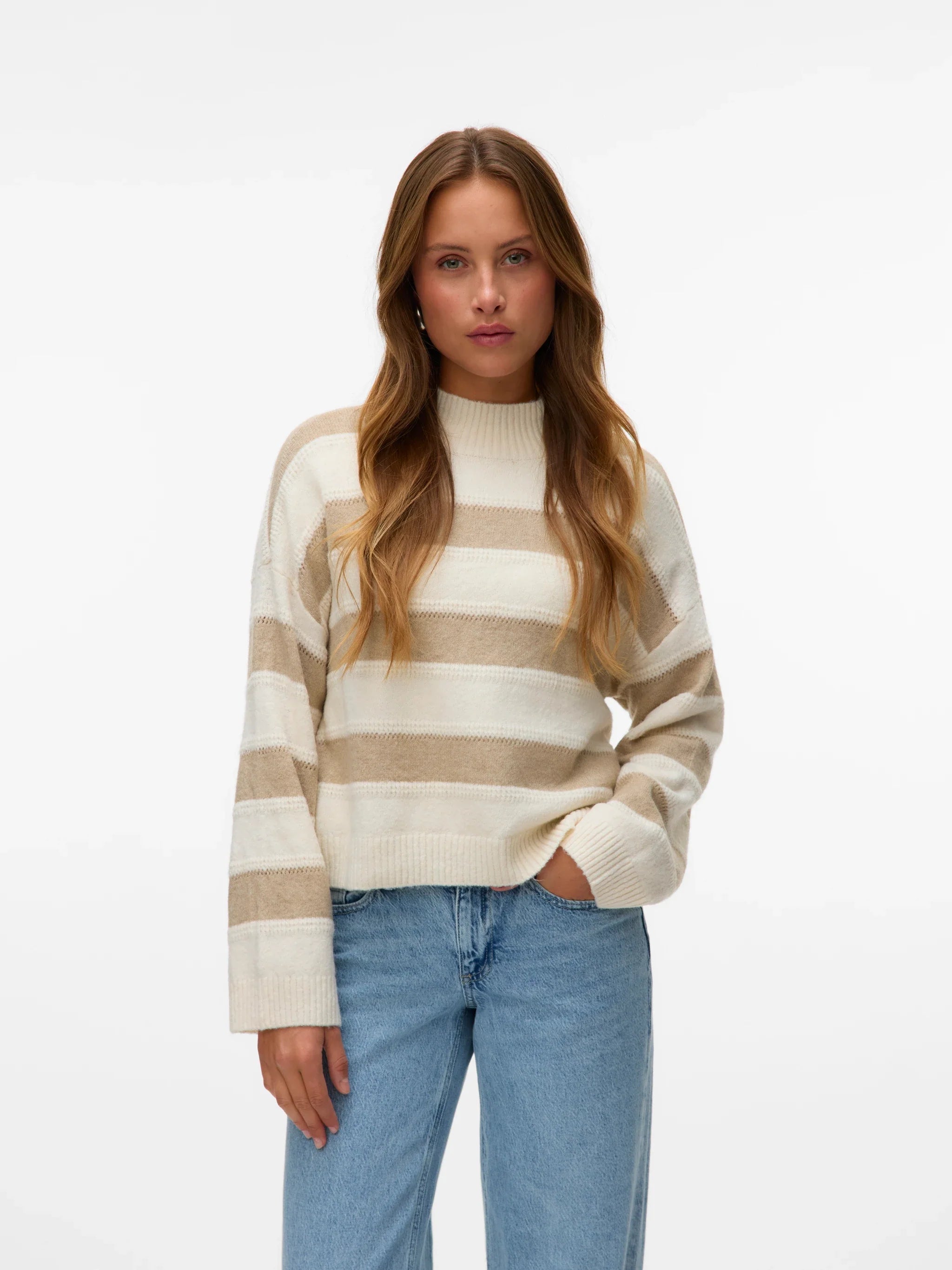 Luxe neutral sweater with oversized sleeves and quiet luxury winter fashion trend